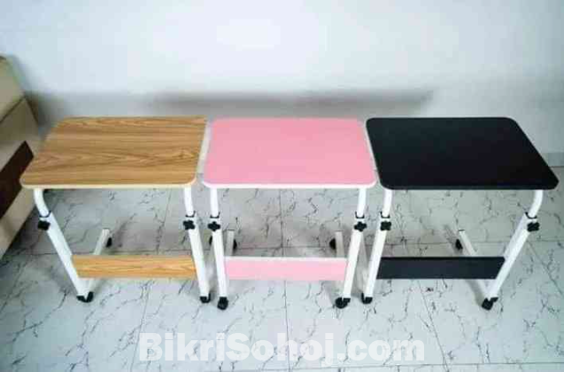 Adjustable and movable table